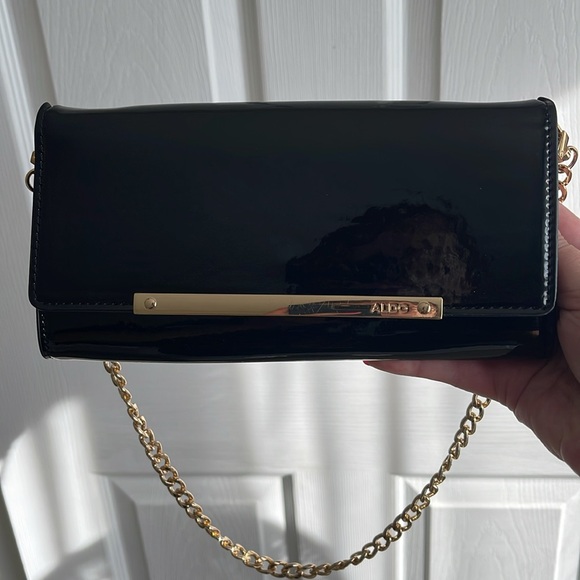 Aldo Handbags - Aldo Glossy Black Clutch with Gold Chain